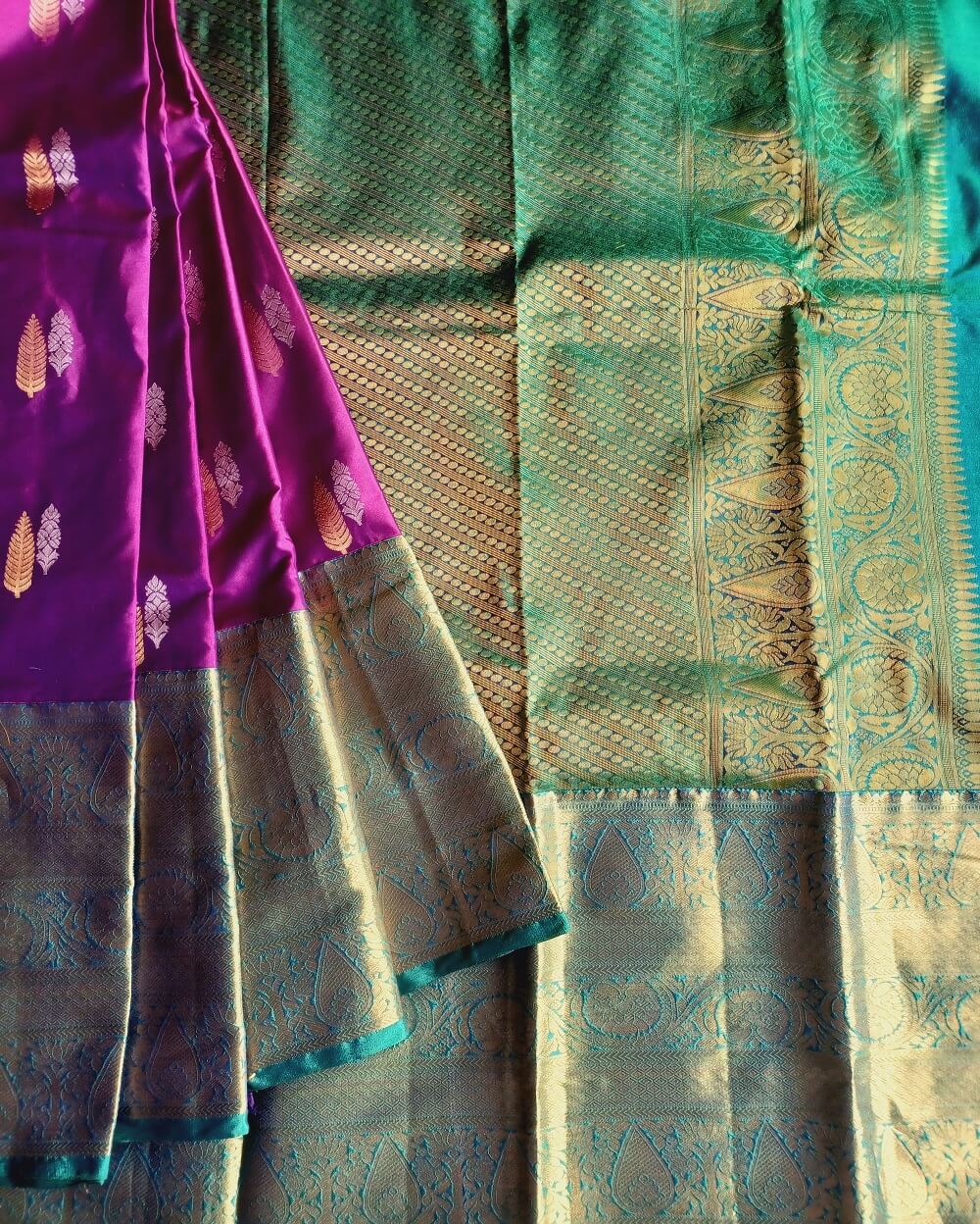 Kanchipuram / Kanjivaram Silk Saree with High quality Zari is used to finish the saree with a grand look. Purple saree with Dark Green Border and Pallu.