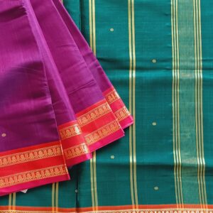 Devendra Handloom Pure Ahimsa silk with cotton saree. Ahimsa Silk Thread borders with Kumbam (Kalash) motifs. Saree is of Violet shade with Ganga Jamuna Border.
