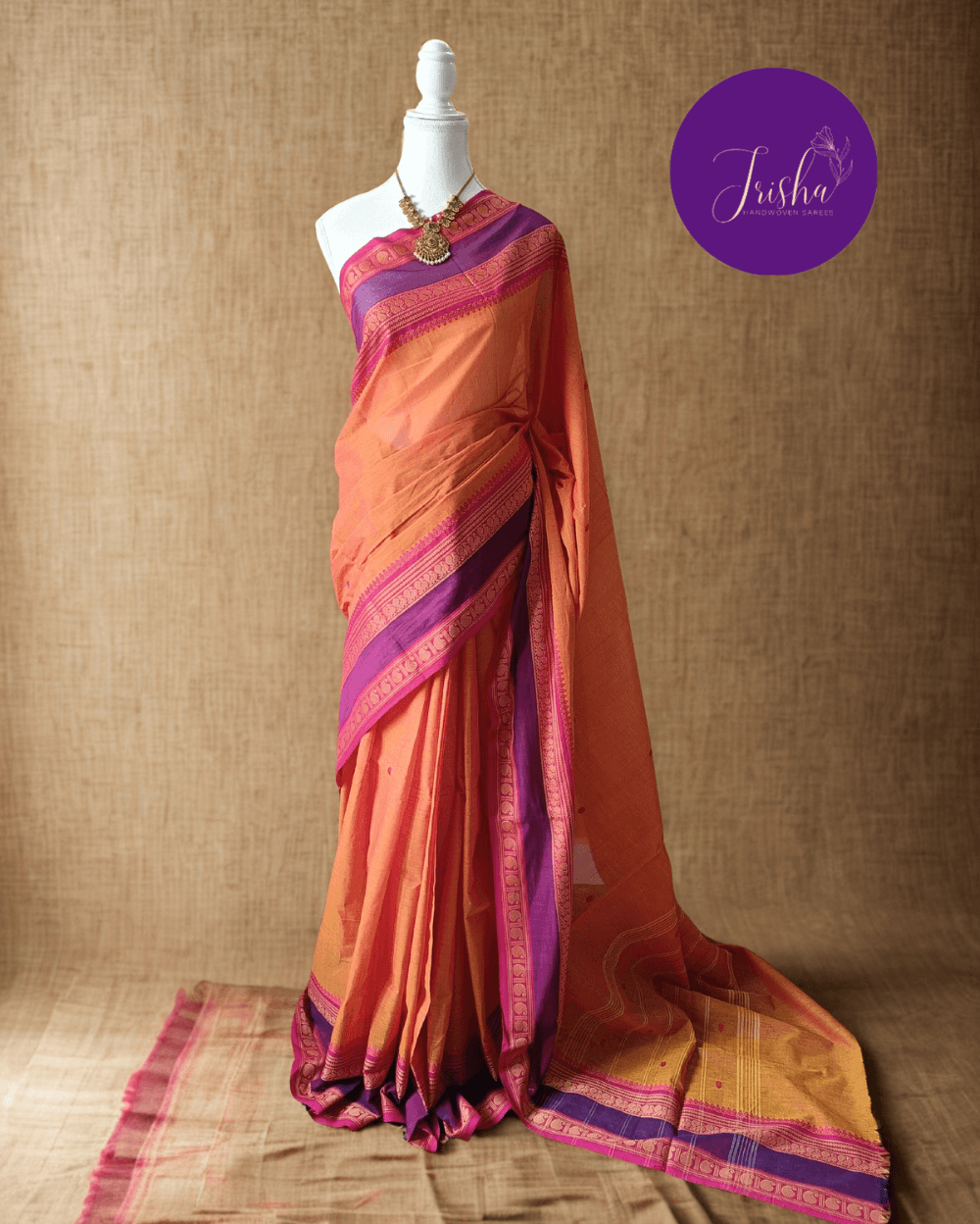 Pure Kanchi Cotton Saree in Yellow Shade With Pink Border, it has Buttas on Saree and Thread Border with traditional Peacock and Mango Motifs.