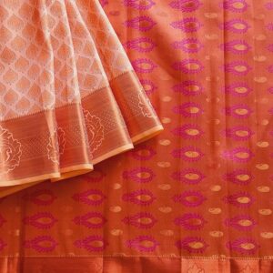 Kanchipuram/ Kanjivaram Silk Saree, A royal light Sandalwood shade with copper zari work all over the saree, a copper zari self border with contrast Pink Pallu. This saree comes with a Pink colour Blouse piece attached.