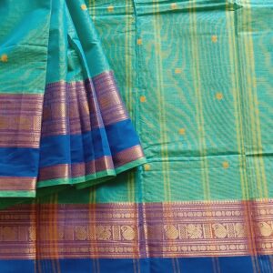 Kanchi Cotton Saree in Light Green with Blue Dual Tone, It has Small Buttas all over Saree with Zari Big Border with Traditional Peacock and Mango Motifs.