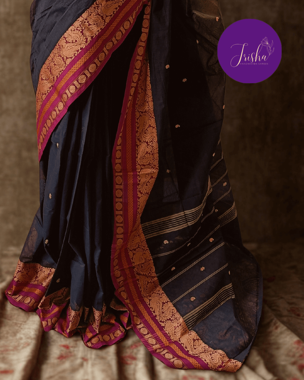 Chettinad Cotton Saree in Black with Pink border, It has Buttas on saree with Thread woven border in Peacock and Rudraksham motifs and Simple Pallu with stripes.