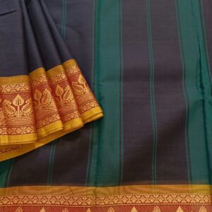 Chettinad Cotton Saree in Dark Blue Shade with Mustard Yellow border. It's plain saree with Thread woven border with leaf motifs and Simple Pallu with stripes.