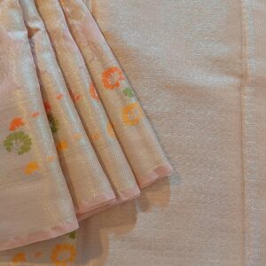 Georgette Saree in Light Rose Gold with Silver zari weaves in the famous Banarasi Jaal work. Border has Banarasi floral motifs with Meena work.