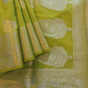 Georgette Saree in Light Leaf Green with Silver zari weaves in the traditional leaf motifs. Border has Banarasi floral motifs, Pallu has Rich silver zari work.