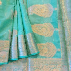 Georgette Saree in Sea Green shade with Silver zari weaves in the traditional leaf motifs. Border has Banarasi floral motifs and Pallu has Rich silver zari work