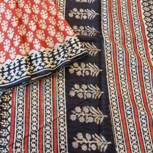 Pure Mulmul Cotton Saree in Maroon Shade. This soft cotton saree has been completely hand block printed with Bagru prints in floral motifs with natural dyes.