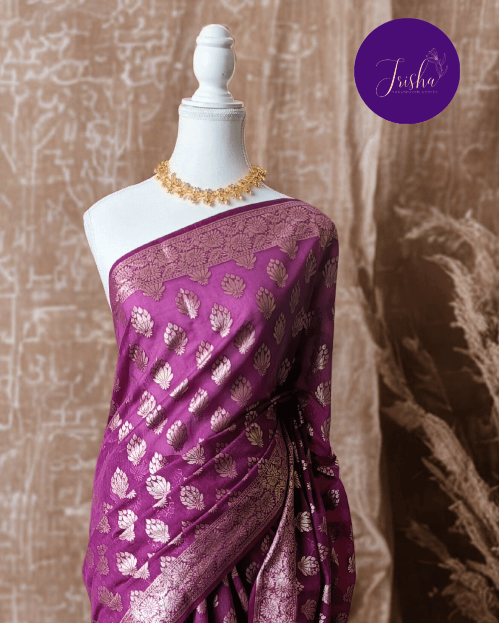 Soft Pure Chanderi Cotton Saree in Purple Shade with Floral motifs woven all over saree. It has Light Gold zari border with woven floral motifs on both sides.