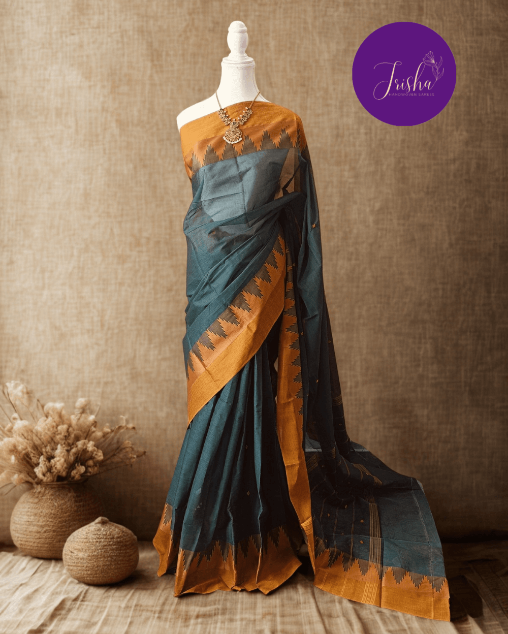 Handloom Kanchi Cotton Saree in Sea Green shade with Yellow border, it has Buttas on Saree and Thread Border with traditional gopuram or temple motifs. These sharp towers like motifs are also known as Thazhampoo motifs.