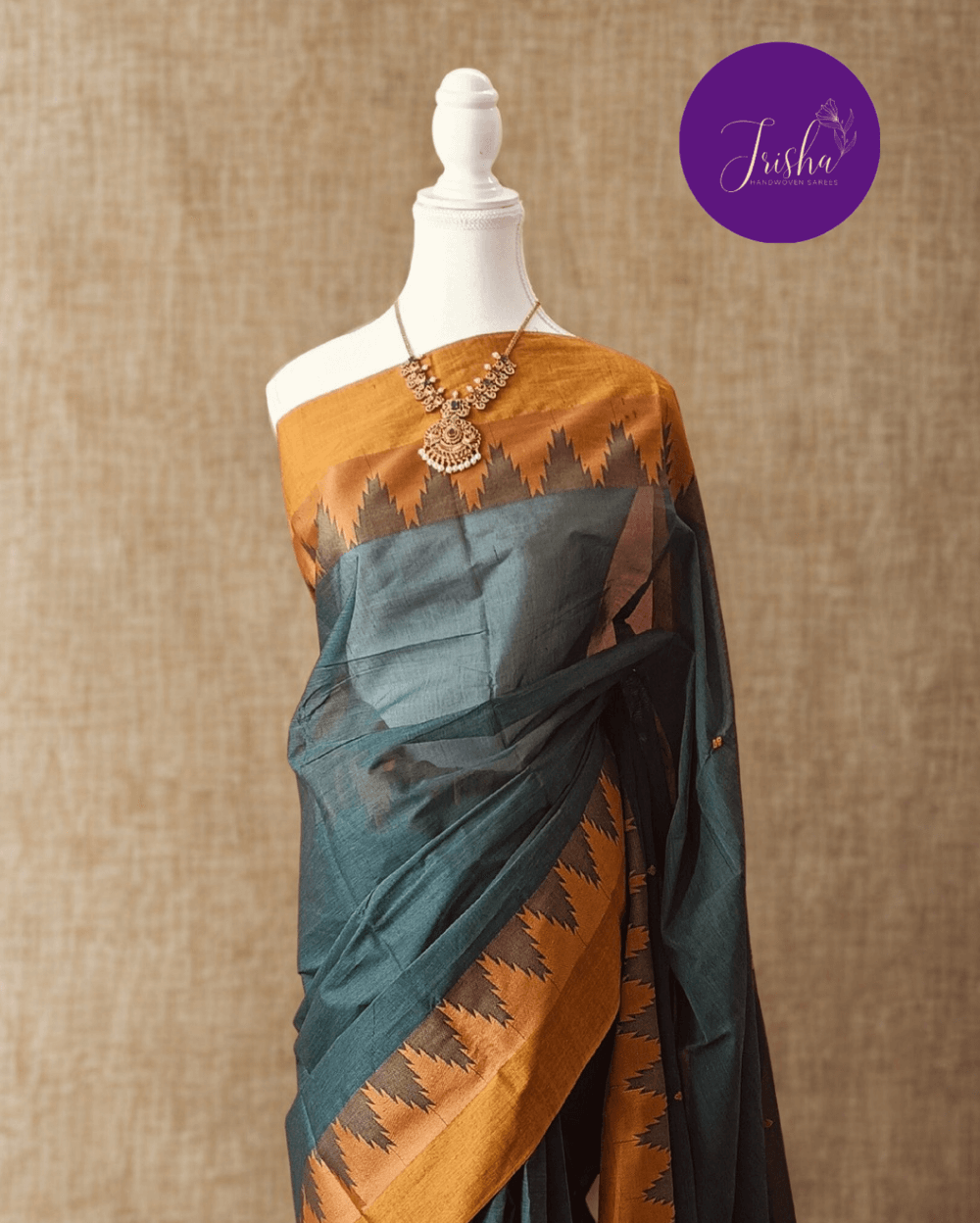 Handloom Kanchi Cotton Saree in Sea Green shade with Yellow border, it has Buttas on Saree and Thread Border with traditional gopuram or temple motifs. These sharp towers like motifs are also known as Thazhampoo motifs.