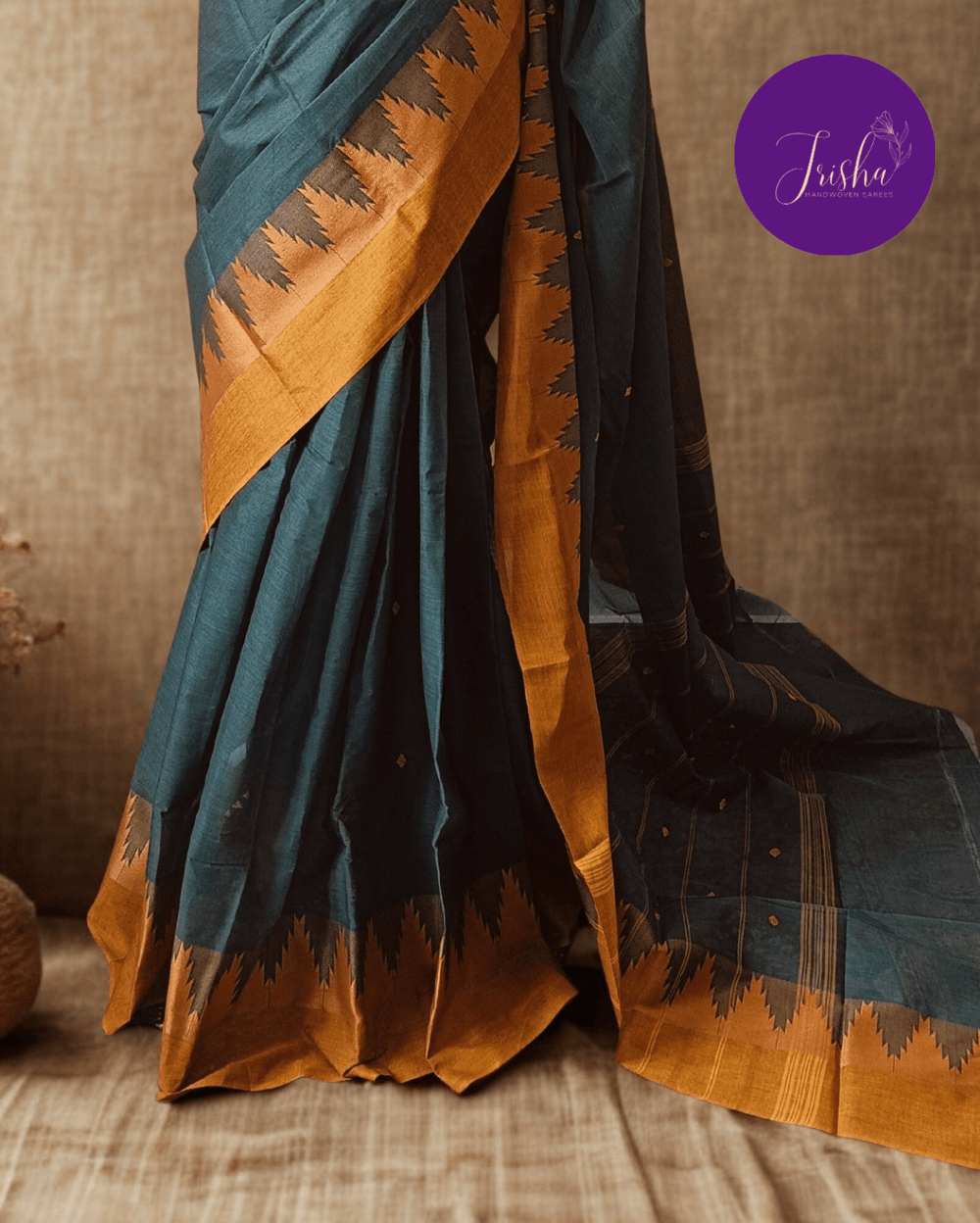 Handloom Kanchi Cotton Saree in Sea Green shade with Yellow border, it has Buttas on Saree and Thread Border with traditional gopuram or temple motifs. These sharp towers like motifs are also known as Thazhampoo motifs.