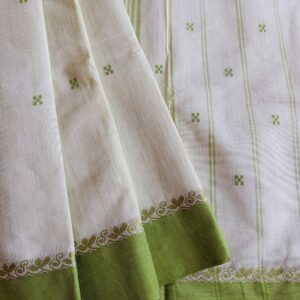 Handloom Pure Kanchi Cotton Saree in Whiteish Green shade with Light Green border, it has Buttas all over Saree with contemporary motifs small Thread Border.