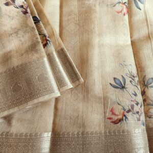 Tussar silk saree in Sand Beige shade with floral digital prints, it has a very elegant silver border with small motifs. A very contemporary earthy shade with subtle shine and classic prints. Saree comes with a blouse piece in small prints