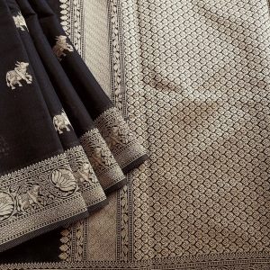 Banarasi Cotton Saree in Black colour with Cream resham threads woven all over. It has traditional Banarasi animal motifs which is a very famous weave.