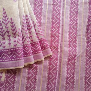 Chanderi Saree silk cotton in Light Beige with purple Jamdani motifs woven all over. Saree comes with a blouse piece in small buttis. Blouse is in contrast shade that matches with the buttis and borders, Pallu has beautiful floral weaves in jamdani pattern.