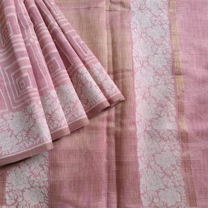 Light Pink Linen saree with Mul Mul cotton fabric .This Linen saree has thread woven geometric square patterns all over the saree. The pallu is simple with a small line of zari woven . It's has beautiful floral border that compliments the over all unique look of the saree. The designs are very contemporary and exclusive.