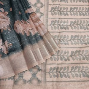 Bottle Green shade Semi Linen saree with silver tissue zari border, this saree comes with digital prints all over the saree with a subtle silver tissue zari border. The pallu is simple with prints.