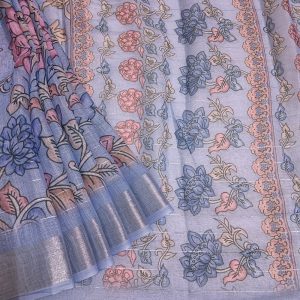 Lavender shade Semi Linen saree with silver tissue zari border, this saree comes with digital prints all over with a subtle silver tissue zari border. The pallu is simple with prints.