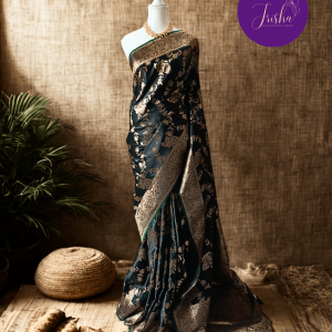 Banarasi Satin silk saree in Dark Bottle Green shade dual tone with peacock and creeper motifs in light gold zari weaves all over the body. Very unique meenakari work done on the motifs in the base fabric shade. It has been woven in the most famous jaal weaves i.e. All the motifs are connected throughout the saree. It has a self border with gold work floral and peacock motifs. The Pallu is richly woven with intricate Banarasi floral motifs. Meenakari work has been done In the border and pallu that compliments the whole look of the saree. It includes self embossed blouse piece with gold border in same design as the saree.