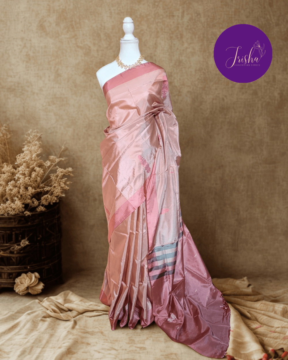 Banana Pith Saree also known as Vaazhainaar pattu. A very rare Baby Pink shade. Pallu is in same shade in a dark tone, saree has Floral Motifs