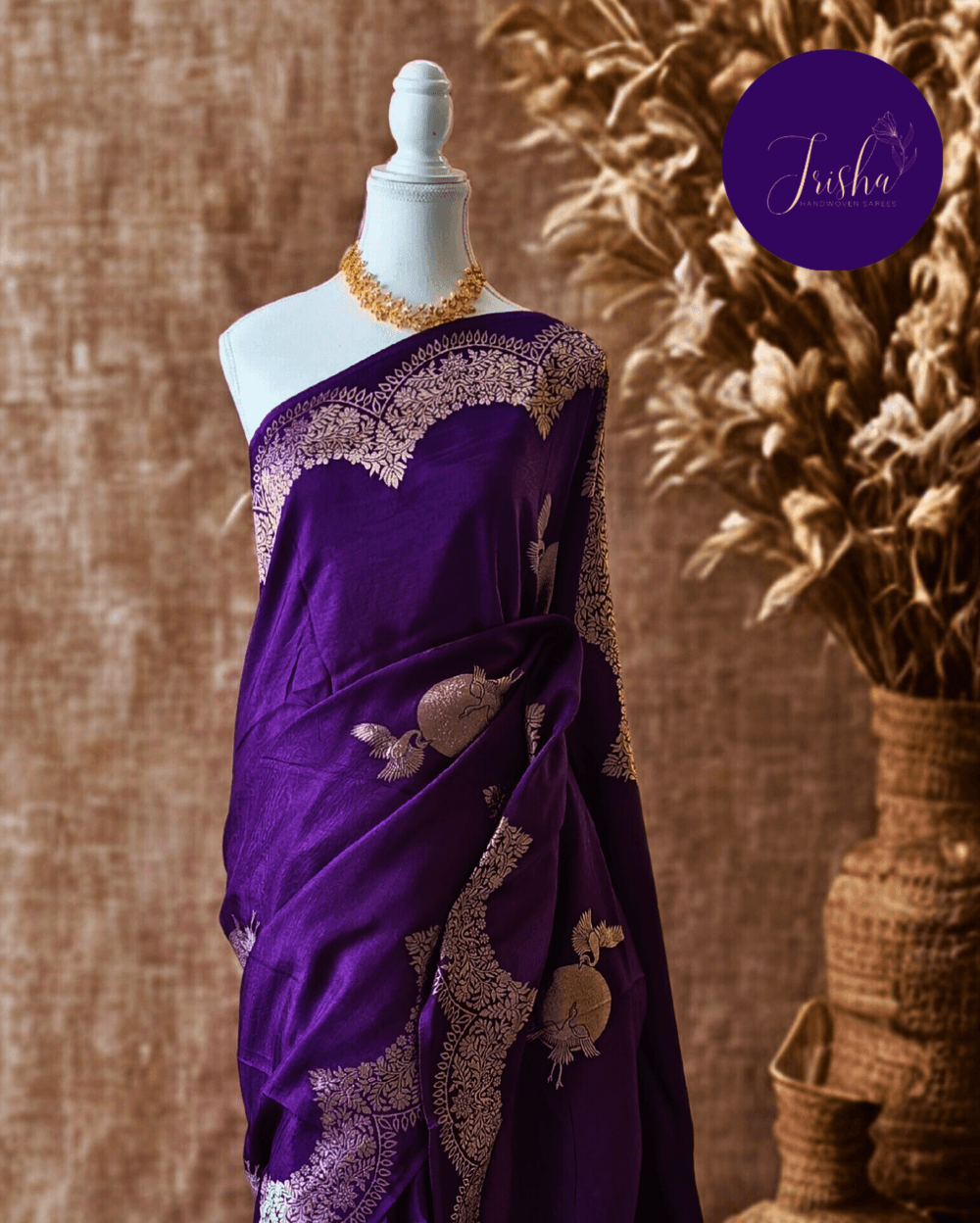 Banarasi Satin Crepe Silk in Royal Violet shade with bird motifs weaves all over the body. Very unique motifs with scallop Design woven in border.It includes plain blouse piece with border in bold and contrast Yellow shade that pairs beautifully the saree and lifts the overall look.