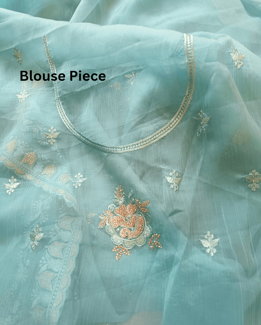 Light Blue Tone with self shade thread embroidery and diamond stone work Chiffon saree. Border throughout the saree and Pallu has rich embroidery and diamond work .The Pallu is beautifully done in a C shape work pattern. The shade has a very pleasant look and and the light embellishments give a complete twist to the subtle look of the saree. Blouse Piece comes with beautiful back design with embroidery and stone work done