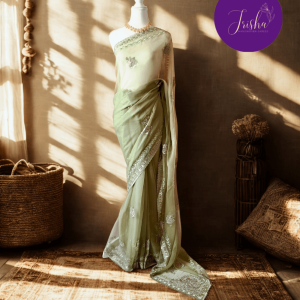 Green Tone with self shade thread embroidery and diamond stone work Chiffon saree. Border throughout the saree and Pallu has rich embroidery and diamond work .The Pallu is beautifully done in a C shape work pattern. The shade has a very pleasant look and and the light embellishments give a complete twist to the subtle look of the saree. Blouse Piece comes with beautiful back design with embroidery and stone work done.