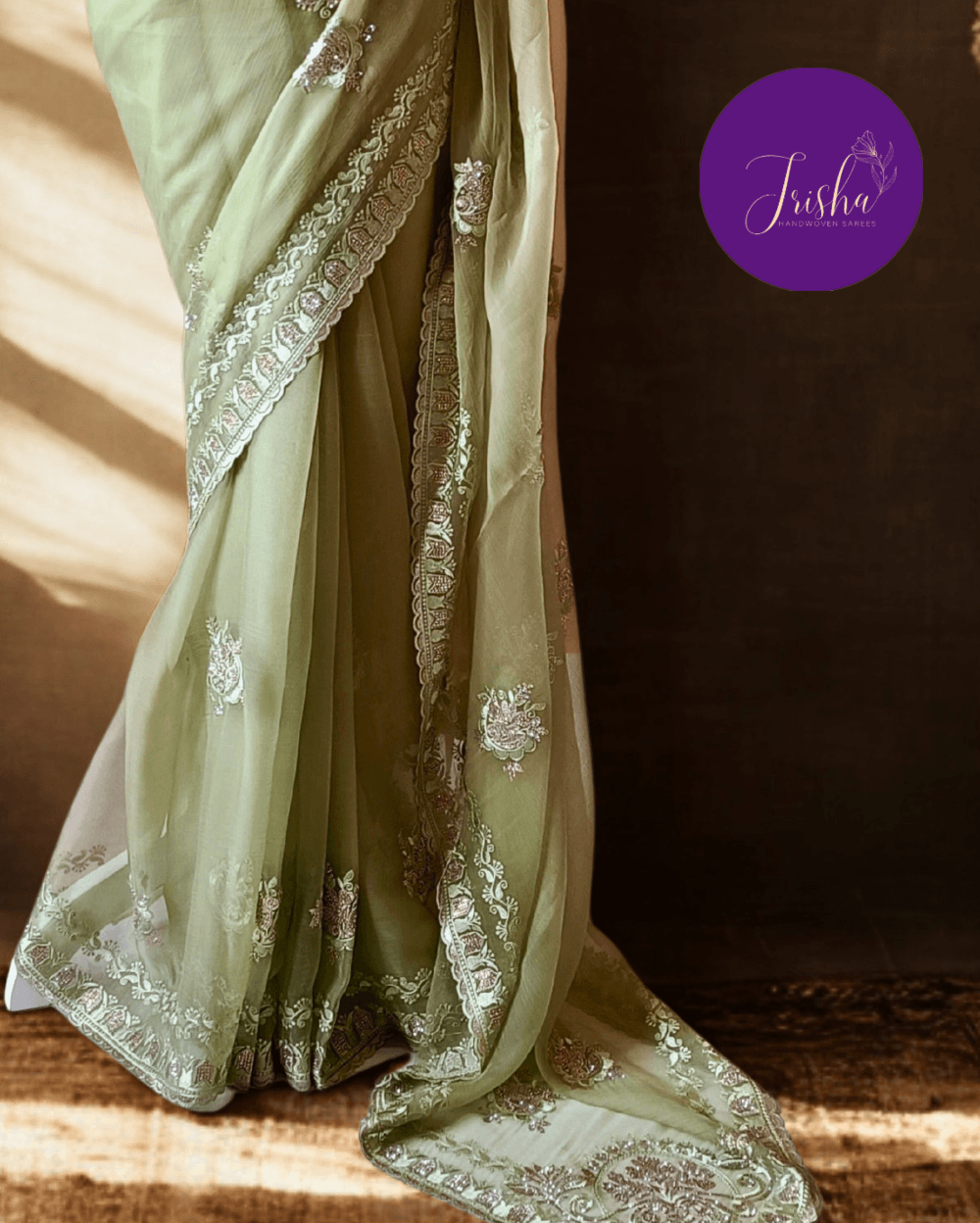 Green Tone with self shade thread embroidery and diamond stone work Chiffon saree. Border throughout the saree and Pallu has rich embroidery and diamond work .The Pallu is beautifully done in a C shape work pattern. The shade has a very pleasant look and and the light embellishments give a complete twist to the subtle look of the saree. Blouse Piece comes with beautiful back design with embroidery and stone work done.