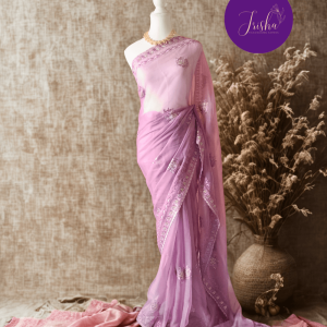 Lilac Tone with self shade thread embroidery and diamond stone work Chiffon saree. Border throughout the saree and Pallu has rich embroidery and diamond work .The Pallu is beautifully done in a C shape work pattern. The shade has a very pleasant look and and the light embellishments give a complete twist to the subtle look of the saree. Blouse Piece comes with beautiful back design with embroidery and stone work done.