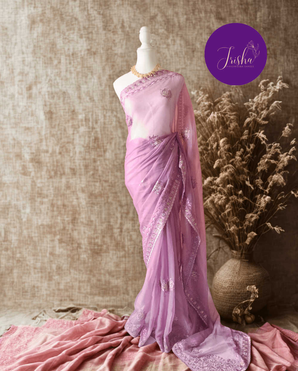 Lilac Tone with self shade thread embroidery and diamond stone work Chiffon saree. Border throughout the saree and Pallu has rich embroidery and diamond work .The Pallu is beautifully done in a C shape work pattern. The shade has a very pleasant look and and the light embellishments give a complete twist to the subtle look of the saree. Blouse Piece comes with beautiful back design with embroidery and stone work done.