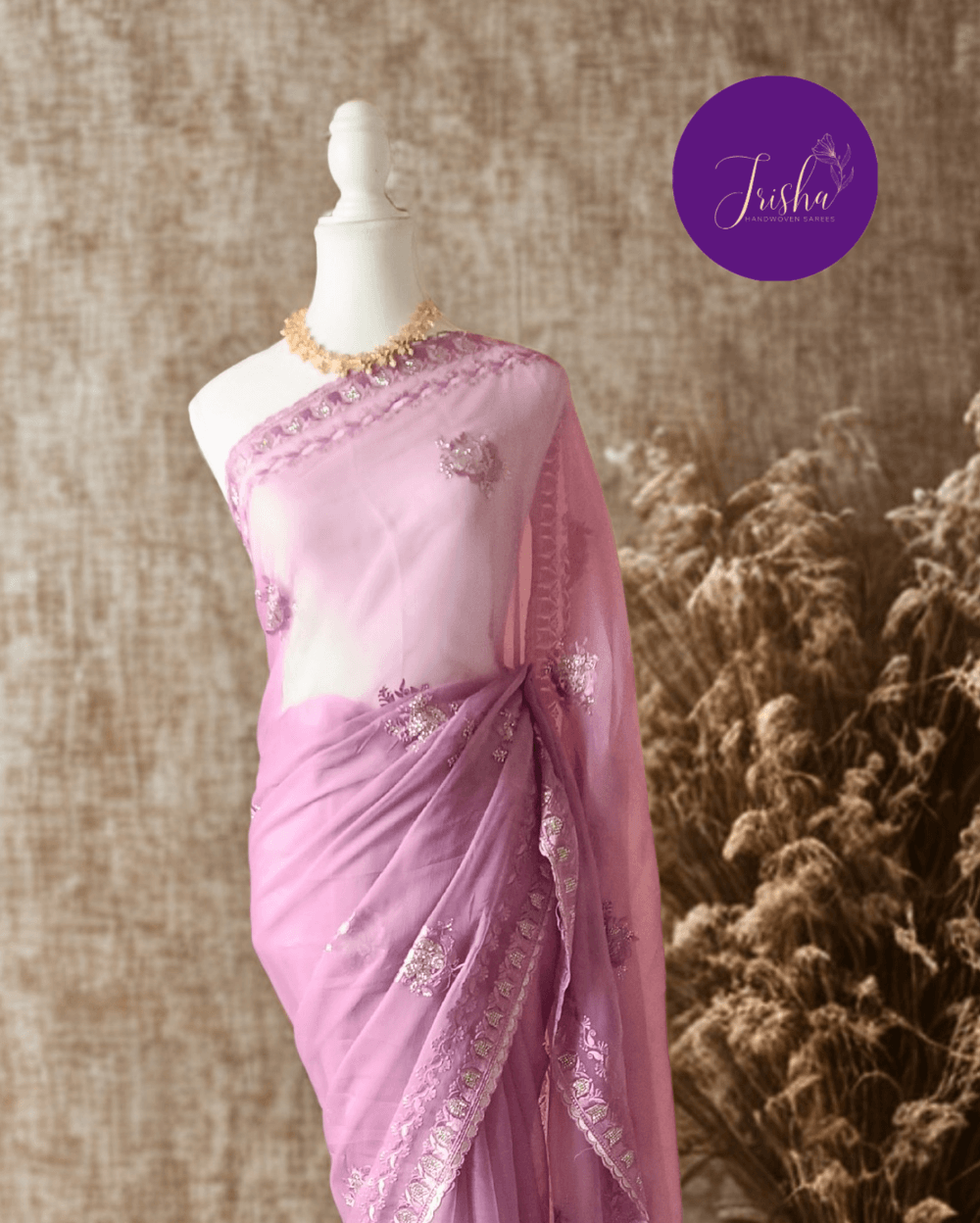 Lilac Tone with self shade thread embroidery and diamond stone work Chiffon saree. Border throughout the saree and Pallu has rich embroidery and diamond work .The Pallu is beautifully done in a C shape work pattern. The shade has a very pleasant look and and the light embellishments give a complete twist to the subtle look of the saree. Blouse Piece comes with beautiful back design with embroidery and stone work done.
