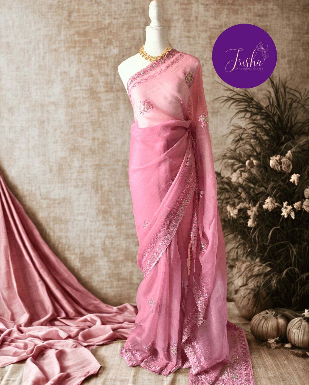 Pink Tone with self shade thread embroidery and diamond stone work Chiffon saree. Border throughout the saree and Pallu has rich embroidery and diamond work .The Pallu is beautifully done in a C shape work pattern. The shade has a very pleasant look and and the light embellishments give a complete twist to the subtle look of the saree. Blouse Piece comes with beautiful back design with embroidery and stone work done.